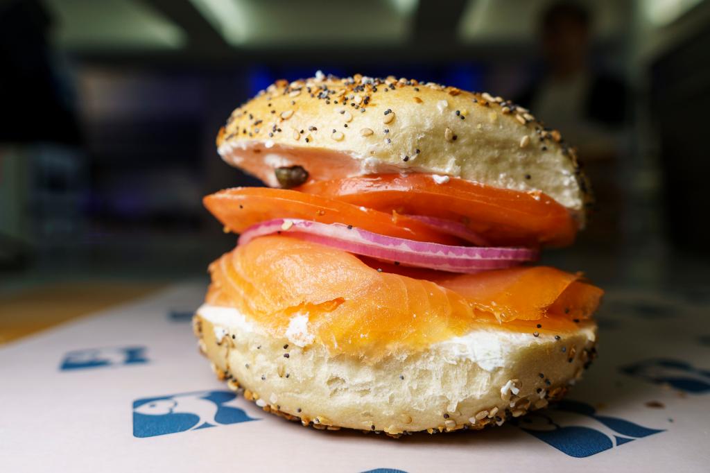 Juan Paris making a lox bagel.