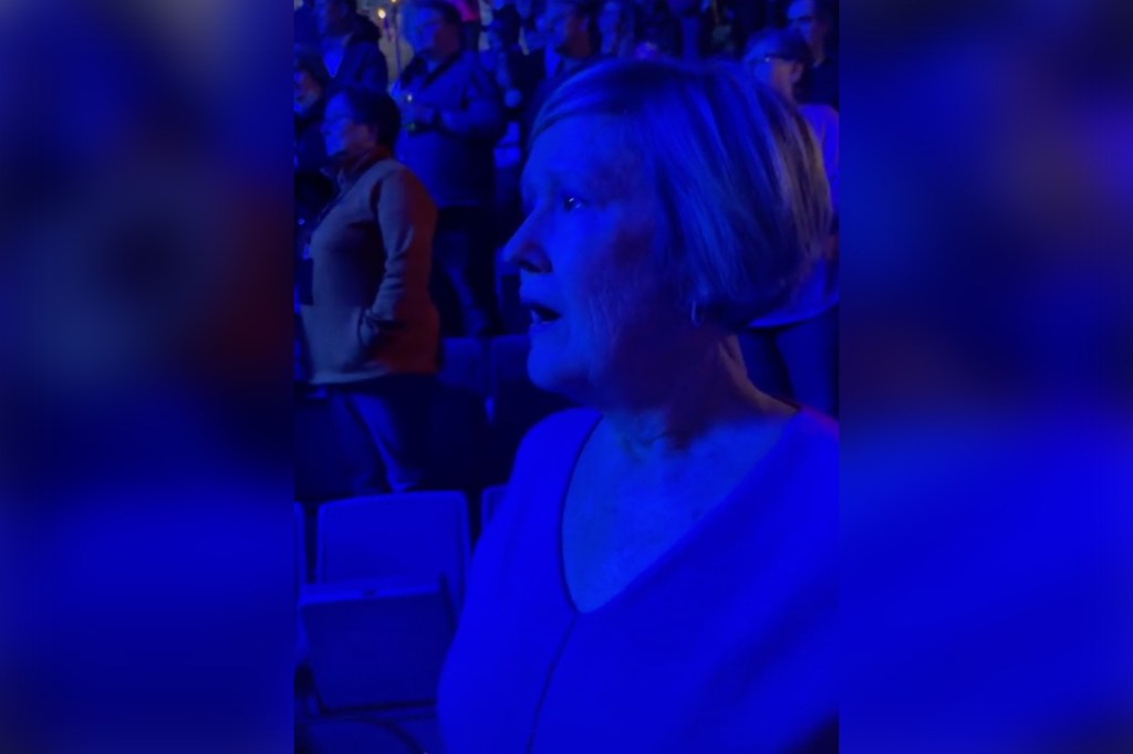 Throughout the video, the mom stares open-mouthed at the stage without saying a word. 