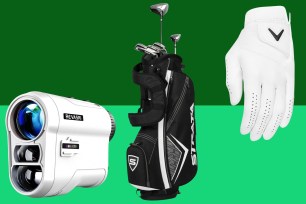 A golf bag, glove and rangefinder on dual colored backdrop.