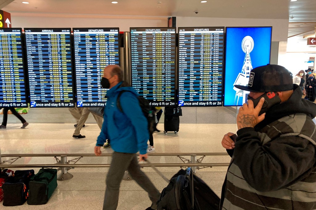 Travelers at Seattle-Tacoma International Airport