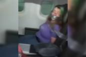 A woman who went viral for having to be duct-taped to her seat on an American Airlines flight for allegedly attacking the crew is now facing a record fine form the FAA.