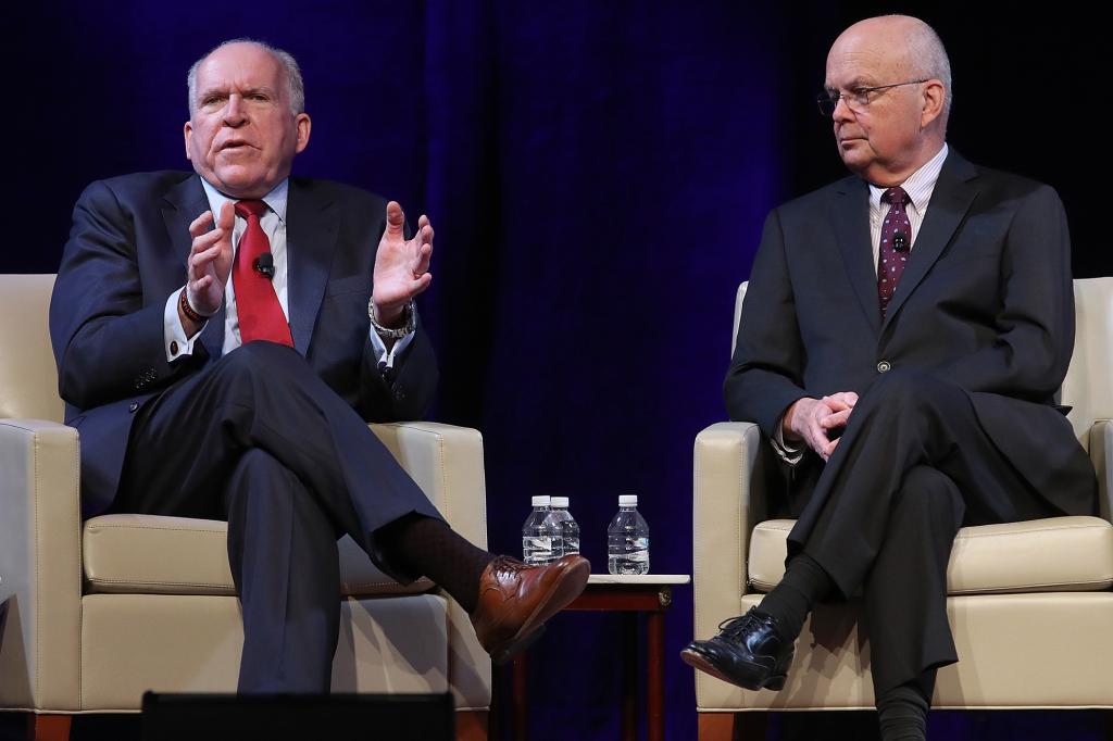 Former Directors of the Central Intelligence Agency John Brennan (L) and Michaeld Hayden (R) participate in a discussion at a conference on "The Ethos and the Profession of Intelligence" at George Washington University October 4, 2017 in Washington, DC.