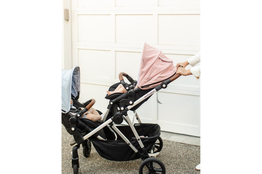 mockingbird stroller with pink and blue canopies