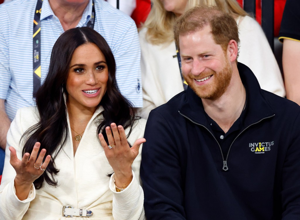 Prince Harry and wife Meghan Markle attend the Invictus Games 2020 at Zuiderpark on April 17, 2022 in The Hague, Netherlands.