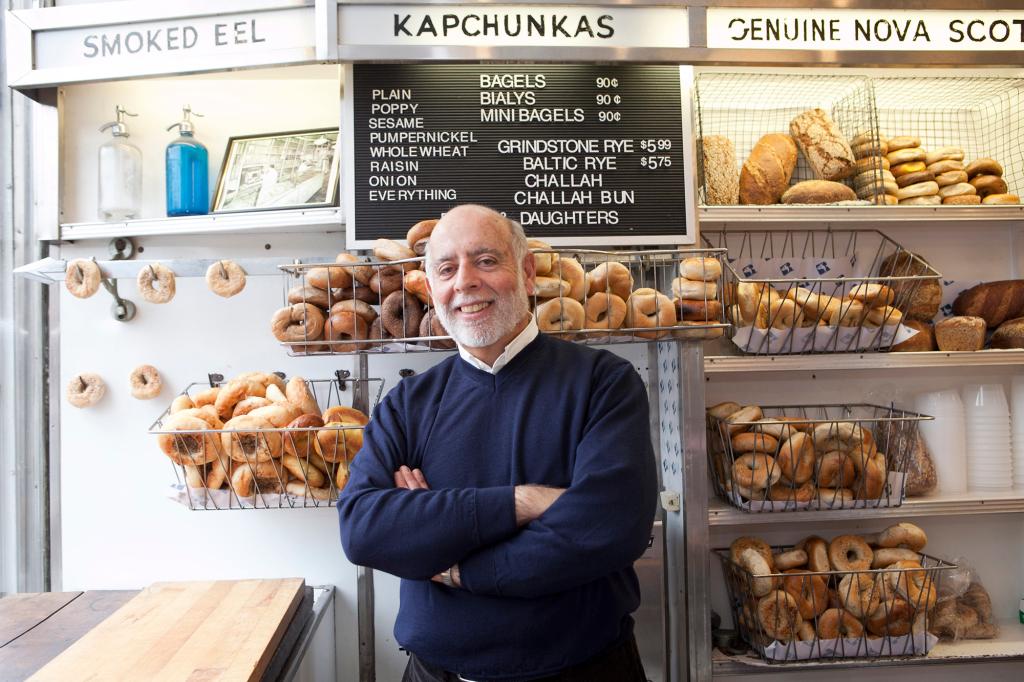 Mark Russ Federman, former owner of Russ & Daughters, poses inside the store.