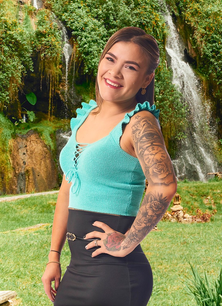 Ximena from 90 Day Fiancé: Before the 90 Days smiles in a teal top. 