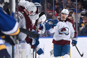 Artturi Lehkonen celebrates with teammates after scoring one of his two goals in the Avalanche's 5-2 win over the Blues in Game 3.