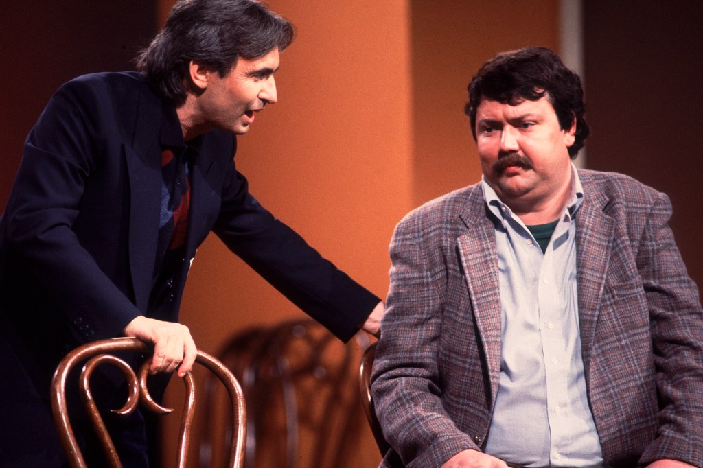 David Steinberg and Mike Hagerty perform onstage during the Second City 25th Anniversary performance at the Vic Theater, Chicago, Illinois, December 16, 1984.
