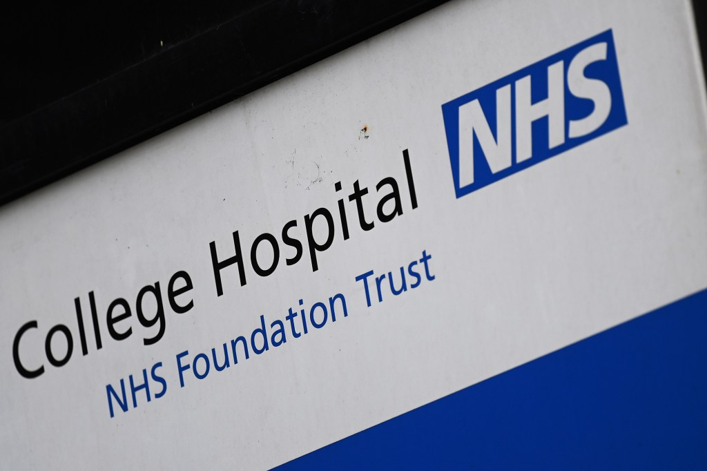 A NHS Trust sign outside a NHS hospital in London, Britain 03 March 2022.