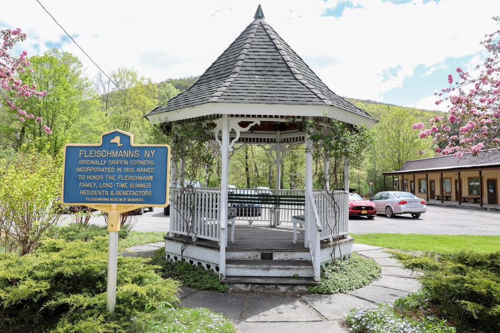 A pavilion next to a Fleischmanns sign.