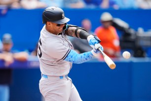 Gleyber Torres connects on a two-run double during the Yankees' loss to the Blue Jays.