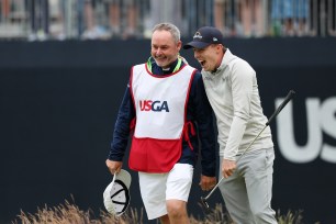 Billy Foster, left, reacts with Matt Fitzpatrick after they win the U.S. Open.
