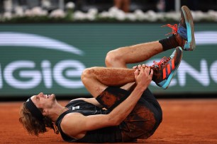 Alexander Zverev of Germany lies injured