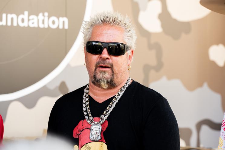 INDIO, CALIFORNIA - APRIL 29: Restauranteur Guy Fieri attends a BBQ demonstration during Day 1 of the 2022 Stagecoach Festival on April 29, 2022 in Indio, California. (Photo by Scott Dudelson/Getty Images for Stagecoach)