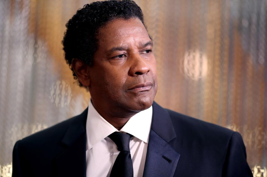 Denzel Washington in a dark suit. 