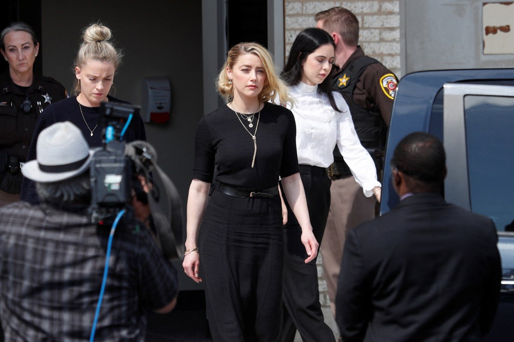 Amber Heard leaves Fairfax County Circuit Courthouse.