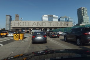 A New Jersey man was arrested for using a fake siren and lights to get through the Holland Tunnel.