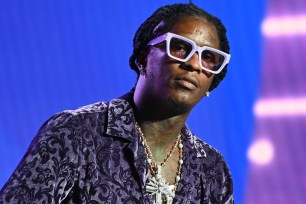 Officials said that Quartavius Mender wrote that he was going to kill the officer for rapper Young Thug's arrest.