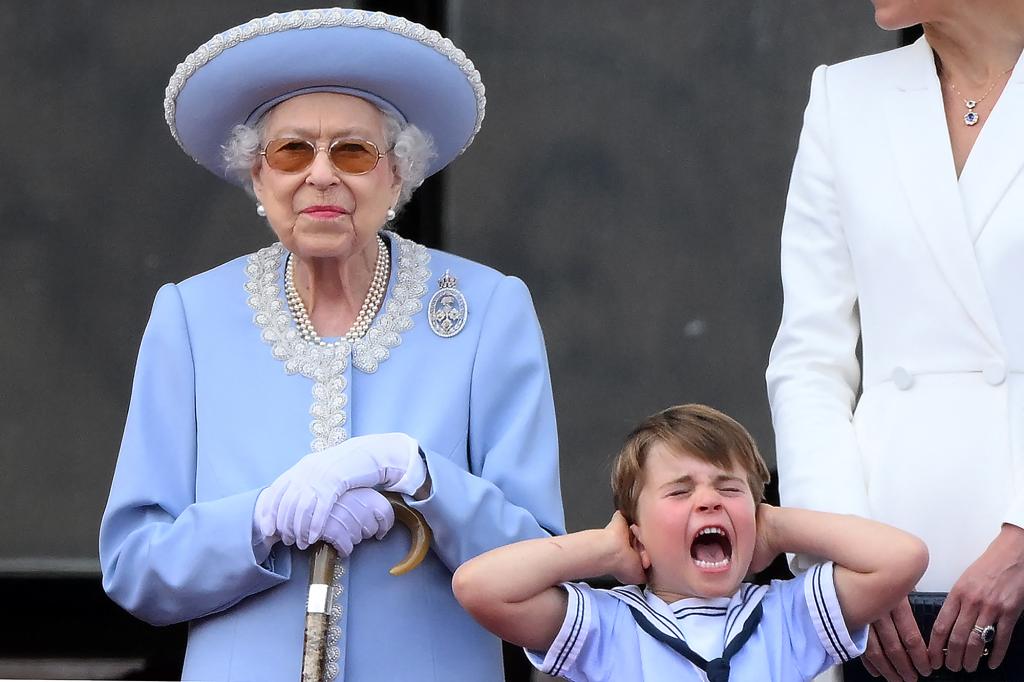 Adorable photos show Prince Louis adorably covering his ears during the Queen's Jubilee flypast.