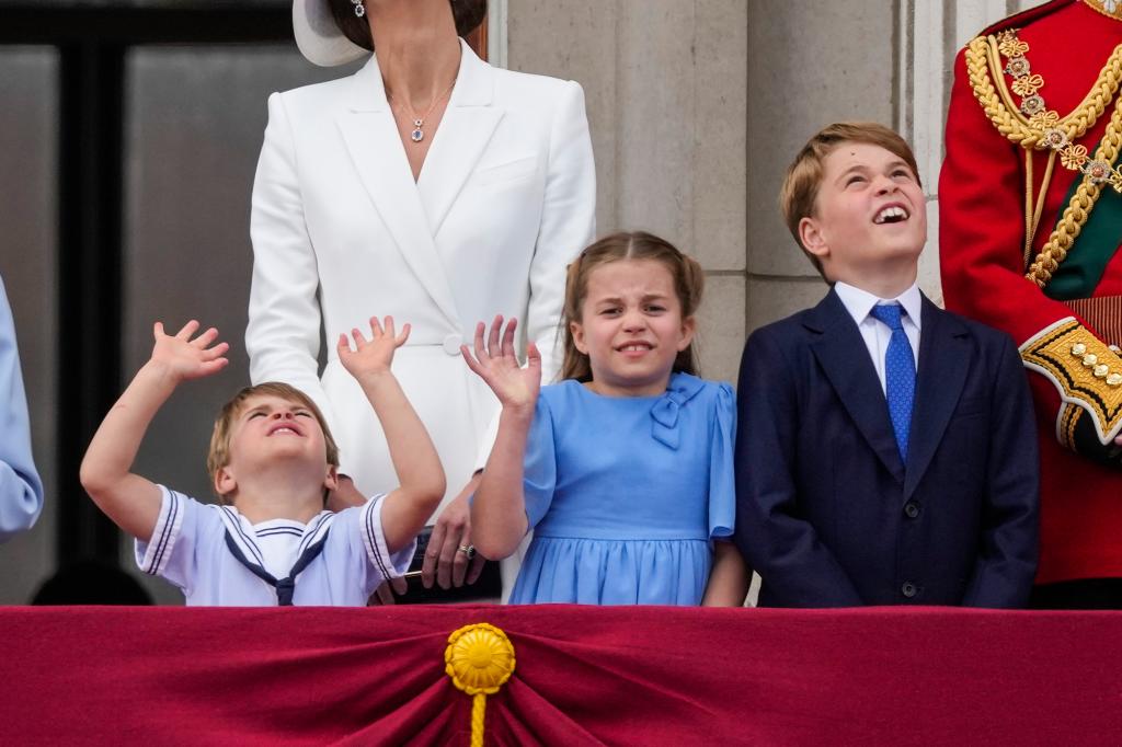 Camilla, Duchess of Cornwall, from left, Prince Charles, Queen Elizabeth II, Prince Louis, Kate, Duchess of Cambridge, Princess Charlotte, Prince George and Prince William on the balcony of Buckingham Palace, London, Thursday June 2, 2022, on the first of four days of celebrations to mark the Platinum Jubilee.