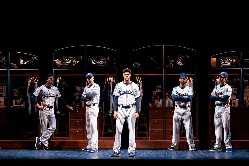 Jesse Williams in a baseball uniform during a performance of the Broadway revival of the baseball-themed "Take Me Out," in New York.