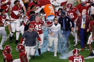 Head coach Nick Saban of the Alabama Crimson Tide is dunked with gatorade following the College Football Playoff National Championship game.