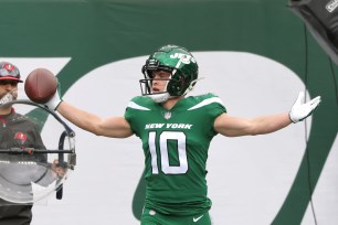 Braxton Berrios celebrates a touchdown against the Buccaneers.