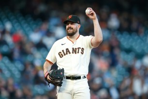 Carlos Rodon pitches for the San Francisco Giants during a game in 2022.