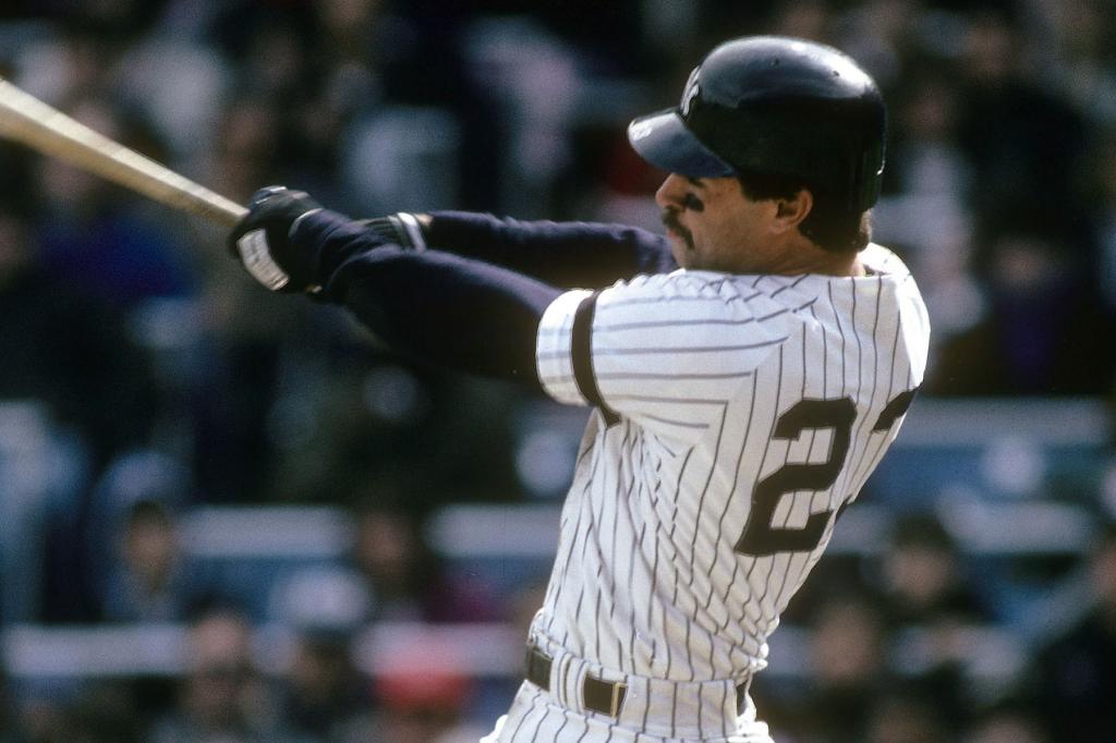 First baseman Don Mattingly #23 of the New York Yankees swings and watches the flight of his ball during a circa 1980's Major League baseball game at Yankee Stadium in Bronx, New York. Mattingly played for the Yankees from 1982-95.
