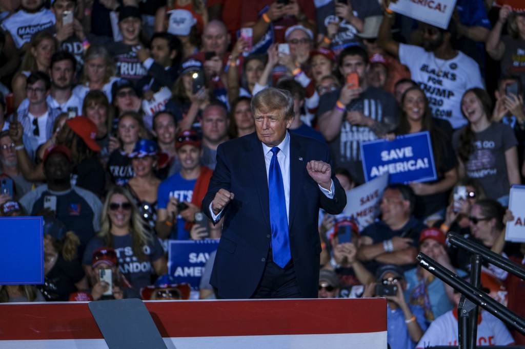 Former U.S. President Donald Trump dances as he leaves the stage during the 'Save America' rally at the Delaware County Fairgrounds in Delaware, Ohio, U.S., on Saturday, April 23, 2022