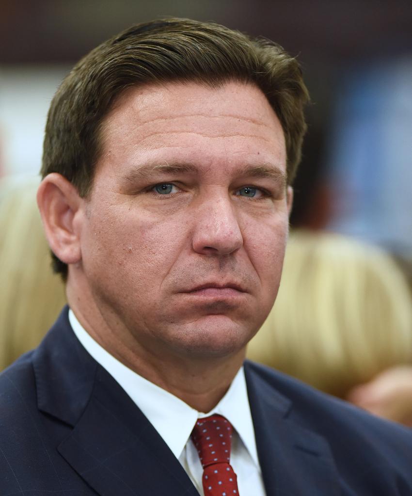 Florida Governor Ron DeSantis listens to a speaker at a press conference at Samâs Club in Ocala, where he signed into law more than $1.2 billion in tax relief for Floridians, the largest tax relief package in Floridaâs history. In an effort to combat inflation, taxes will be eliminated for varying periods of time on goods including fuel, childrenâs books, diapers, and home improvement items. (Photo by Paul Hennessy/SOPA Images/LightRocket via Getty Images)