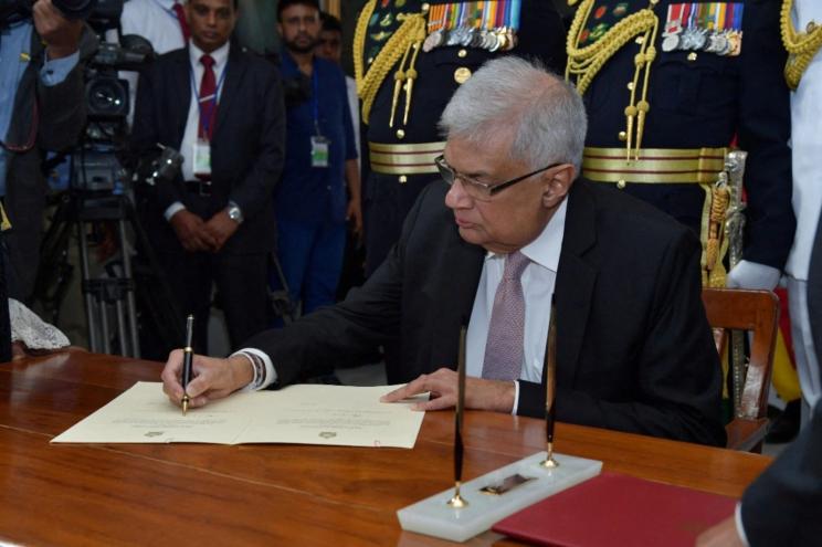 Ranil Wickremesinghe is sworn in as new president of Sri Lanka by Chief Justice Jayantha Jayasuriya at the parliament in Colombo, Sri Lanka on July 21, 2022.