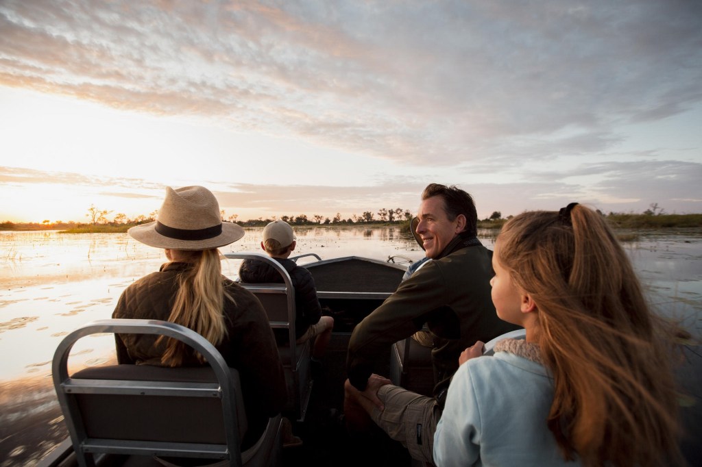 Exterior of visitors taking a boat ride in Botswana.