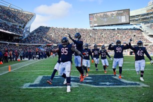 Khyiris Tonga #95 of the Chicago Bears celebrates after fumble recovery in the third quarter of the game against the New York Giants at Soldier Field on January 02, 2022 in Chicago, Illinois.