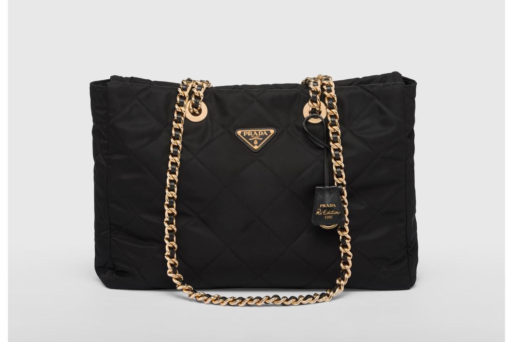 Black bag with gold chain strap.