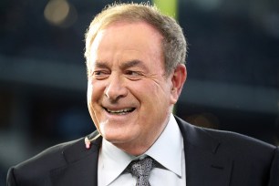 NBC sports broadcaster Al Michaels is seen on the field before the game between the Philadelphia Eagles and Dallas Cowboys at AT&T Stadium on October 20, 2019.