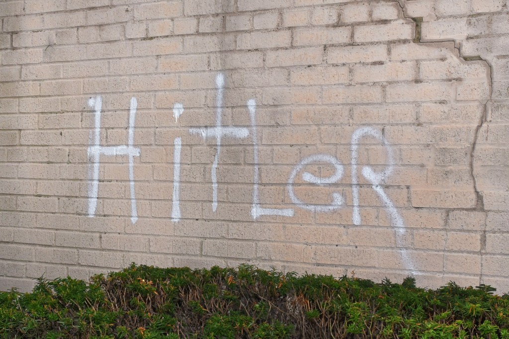 The word "Hitler" written on the Brooklyn synagogue.