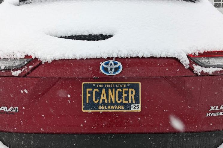 Vanity plate that reads "FCANCER."