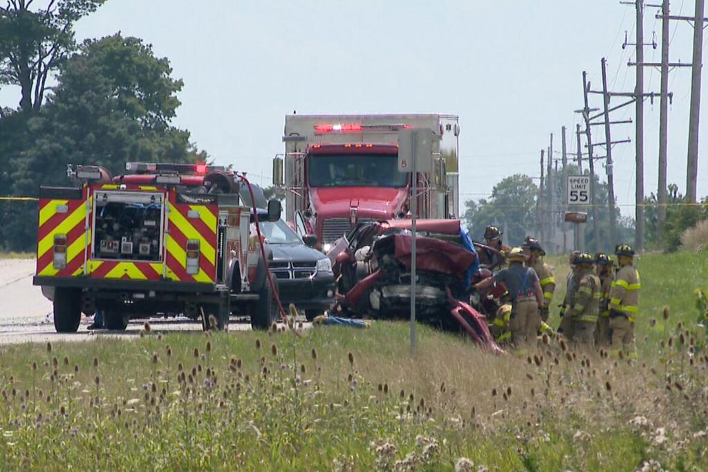 First responders at the scene of the crash that killed Walorski and three others on Route 19.