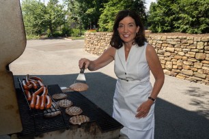Gov. Kathy Hochul was mocked on Twitter for a seemingly staged photo of her grilling meat.