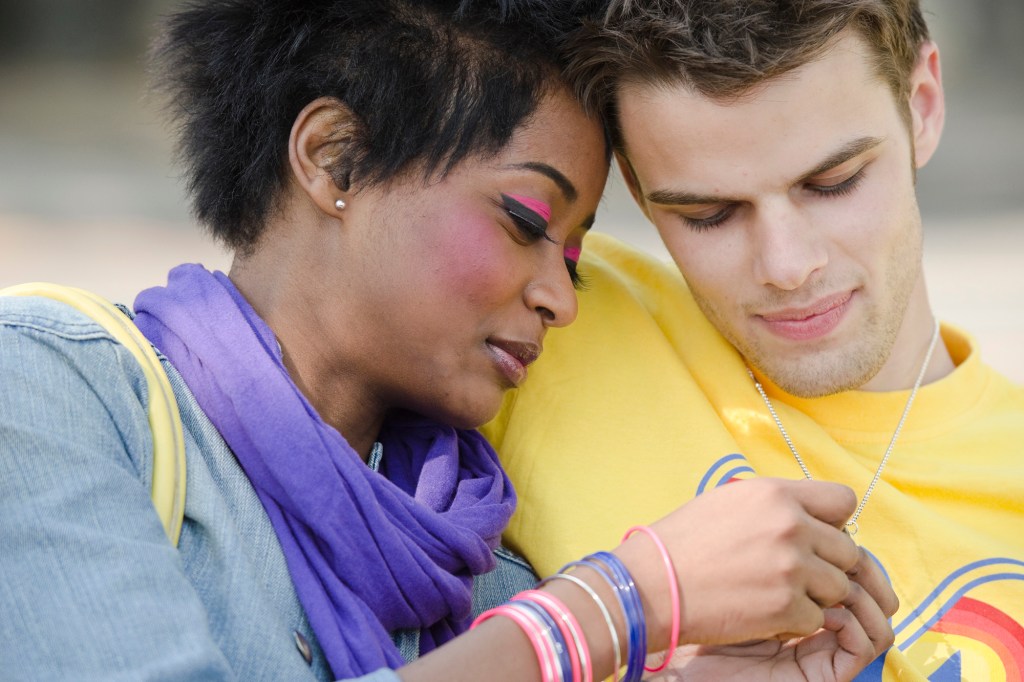 Young interracial couple in love.