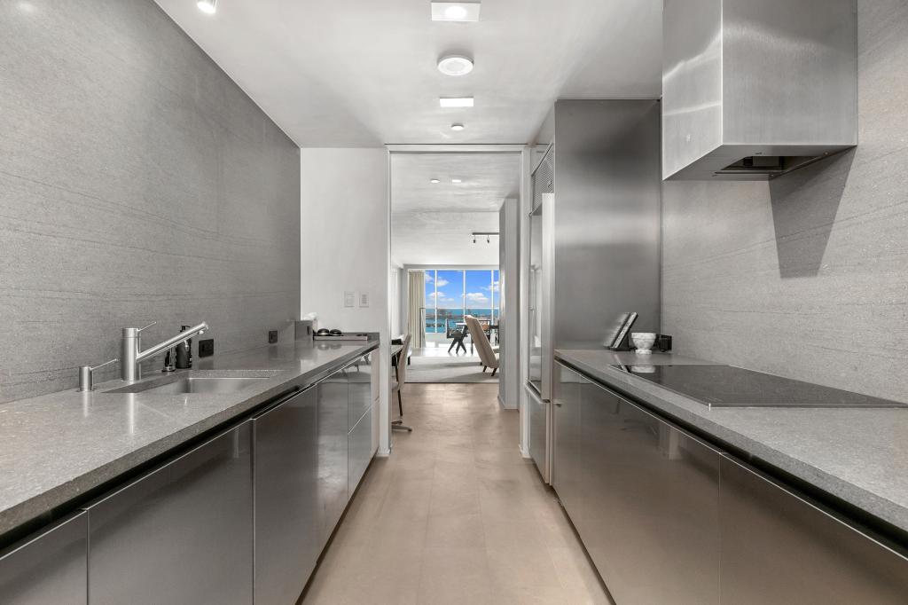 The sleek kitchen inside the Biscayne Boulevard triplex.