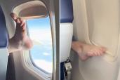 A passenger on a Southwest Airlines flight closed a window shade in another row with her bare foot.