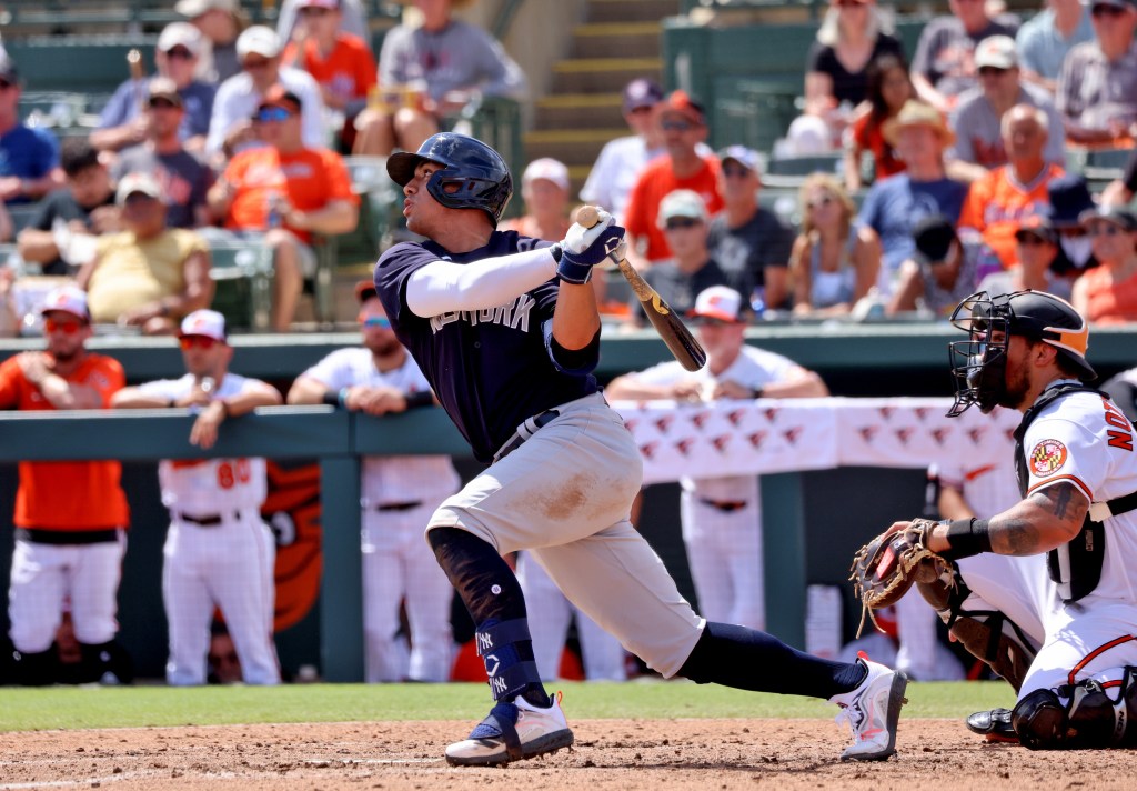 Yankees' Oswald Peraza pops out during a spring training game.