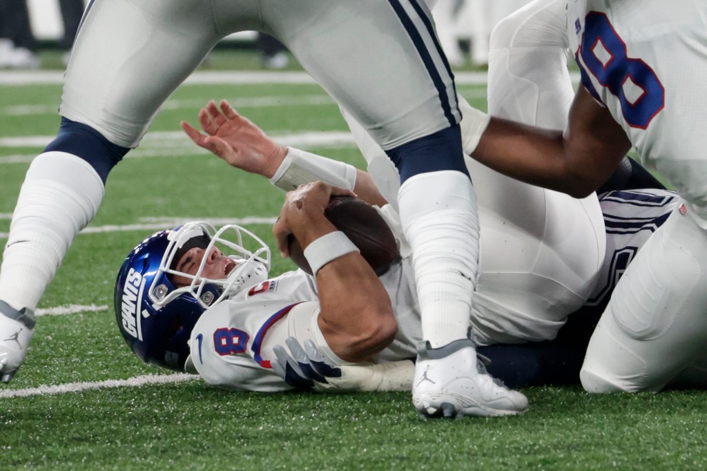 Daniel Jones is sacked during the Giants' win over the Cowboys.