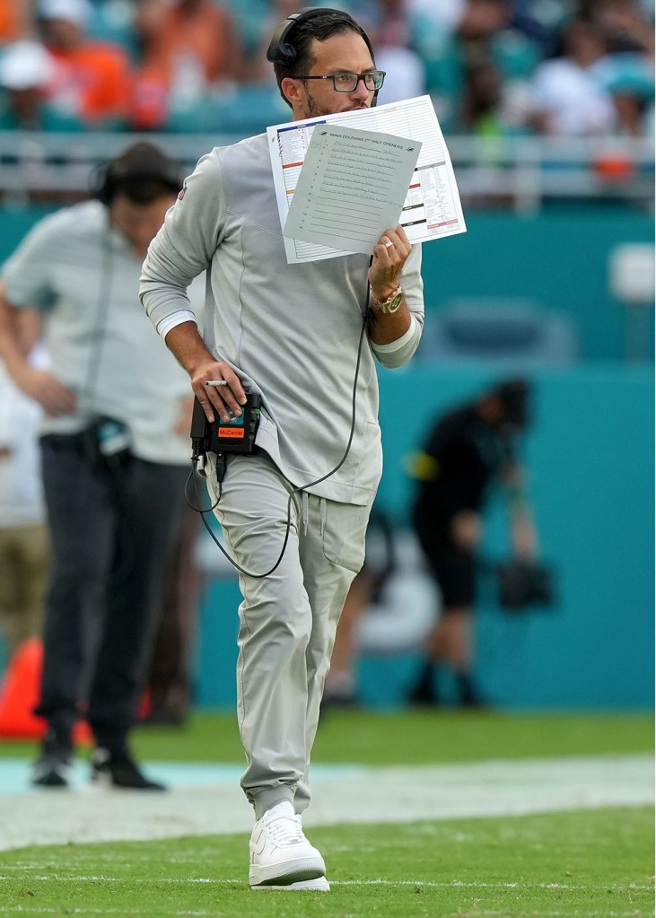 Head Coach Mike McDaniel of the Miami Dolphins walks the sideline during a timeout in the game at Hard Rock Stadium on September 11, 2022 in Miami Gardens, Florida.  