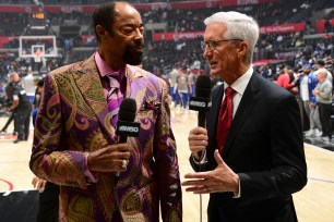 Walt "Clyde" Frazier and Mike Breen talk before a Knicks game against the Clippers this past March.