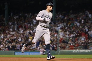 New York Yankees center fielder Aaron Judge #99, runs around the bases, after hitting his 57th homer of the season.