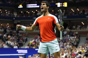 Carlos Alcaraz celebrates during his US Open win on Sunday.