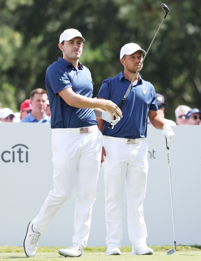 Patrick Cantlay and Xander Schauffele take part in Day 3 of the Presidents Cup on Sept. 24, 2022.